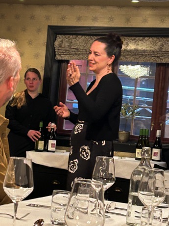 Asa at our farewell dinner recounting two weeks of adentures